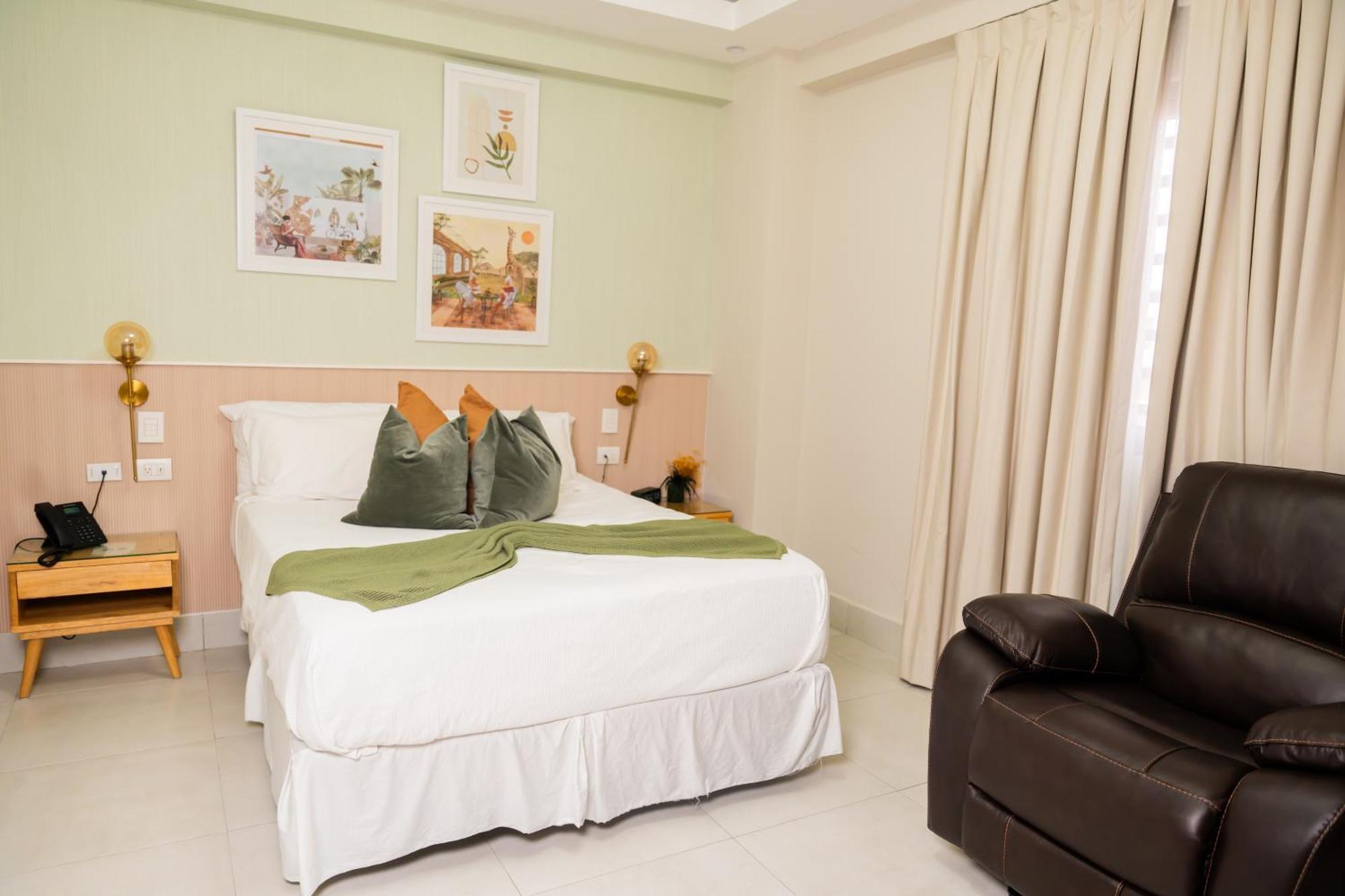 Hotel Stay Here Suites Санто-Доминго Экстерьер фото