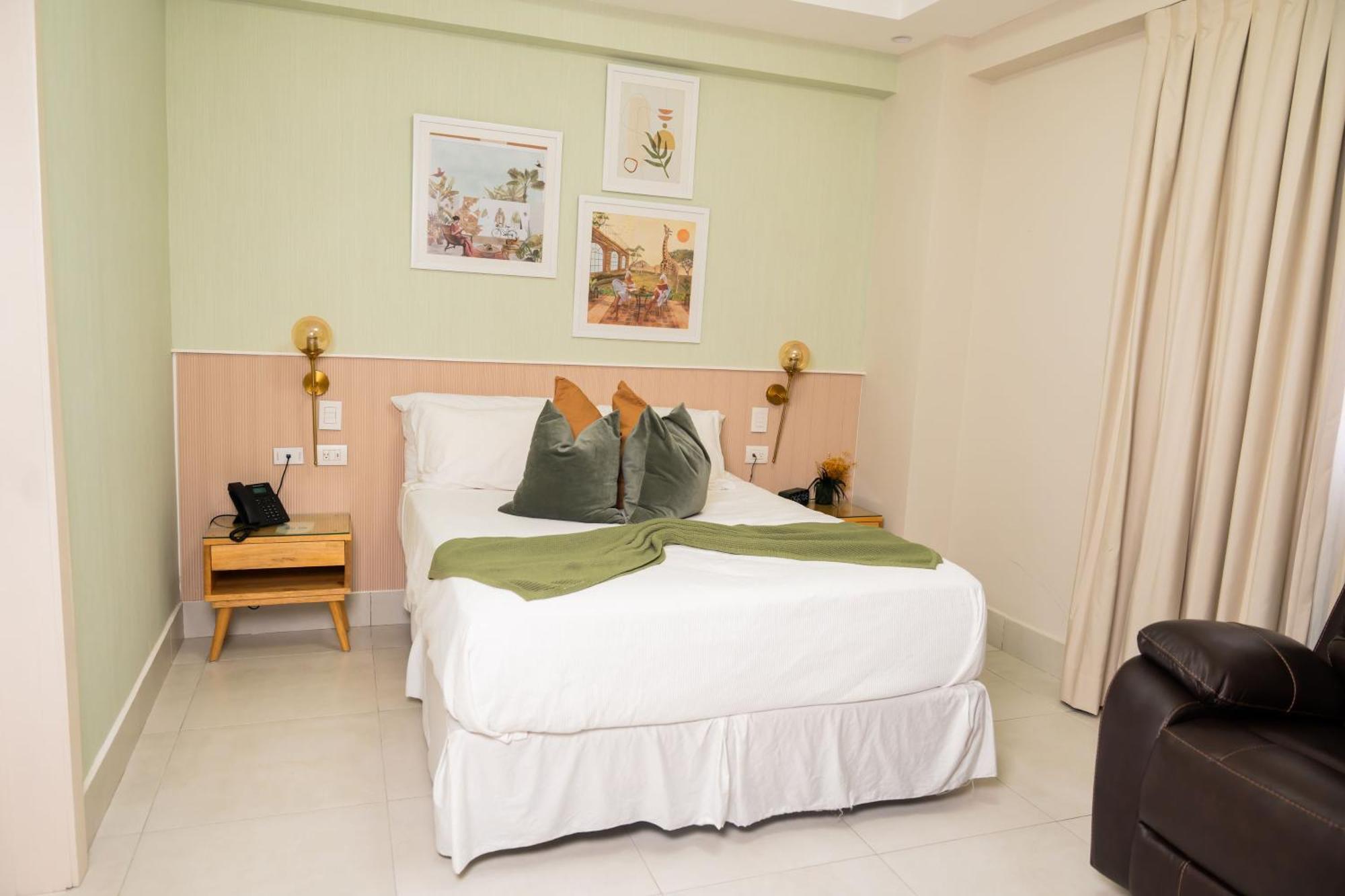 Hotel Stay Here Suites Санто-Доминго Экстерьер фото
