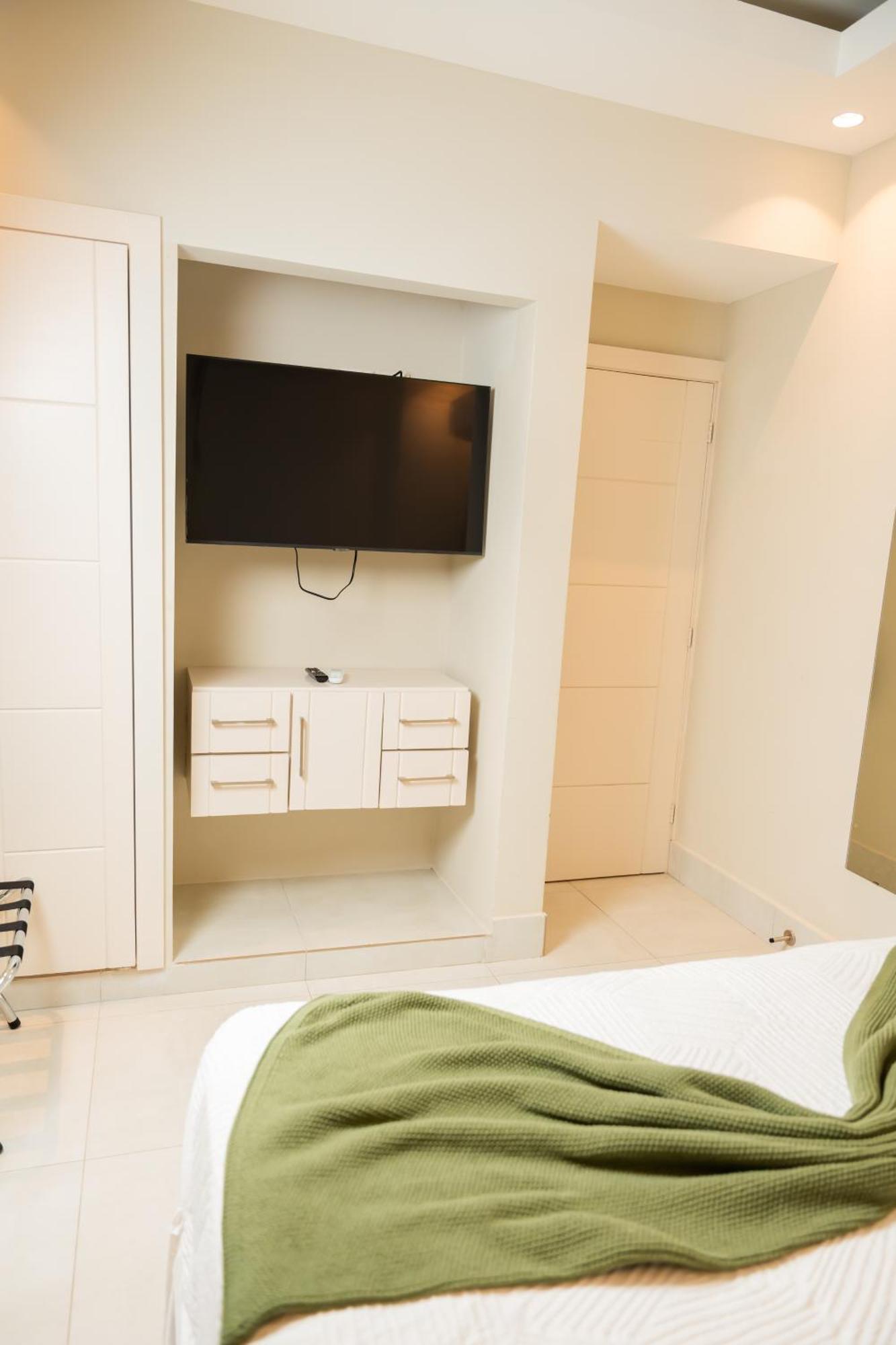 Hotel Stay Here Suites Санто-Доминго Номер фото