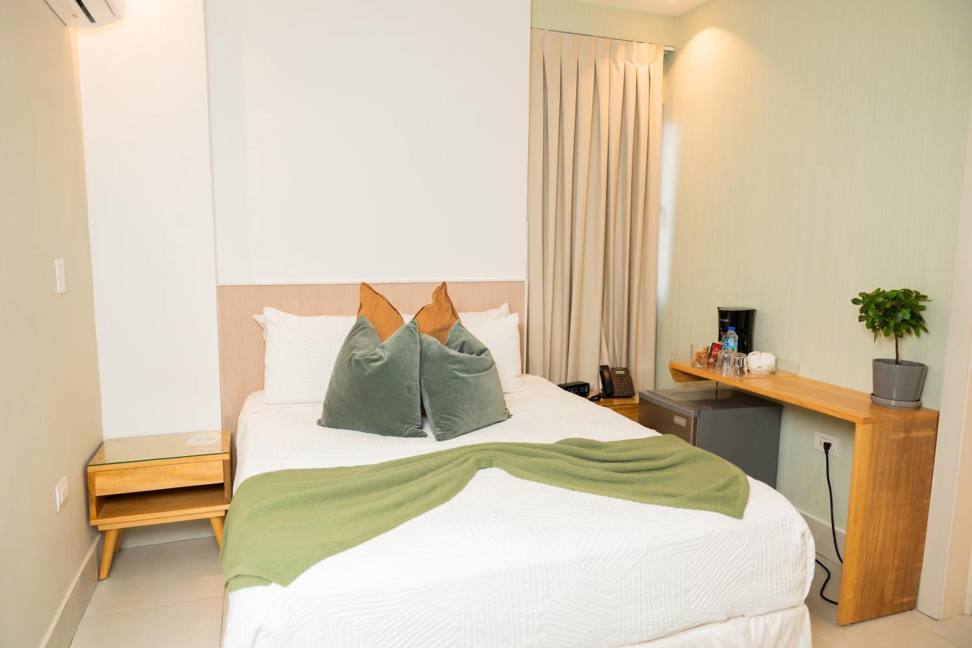 Hotel Stay Here Suites Санто-Доминго Экстерьер фото