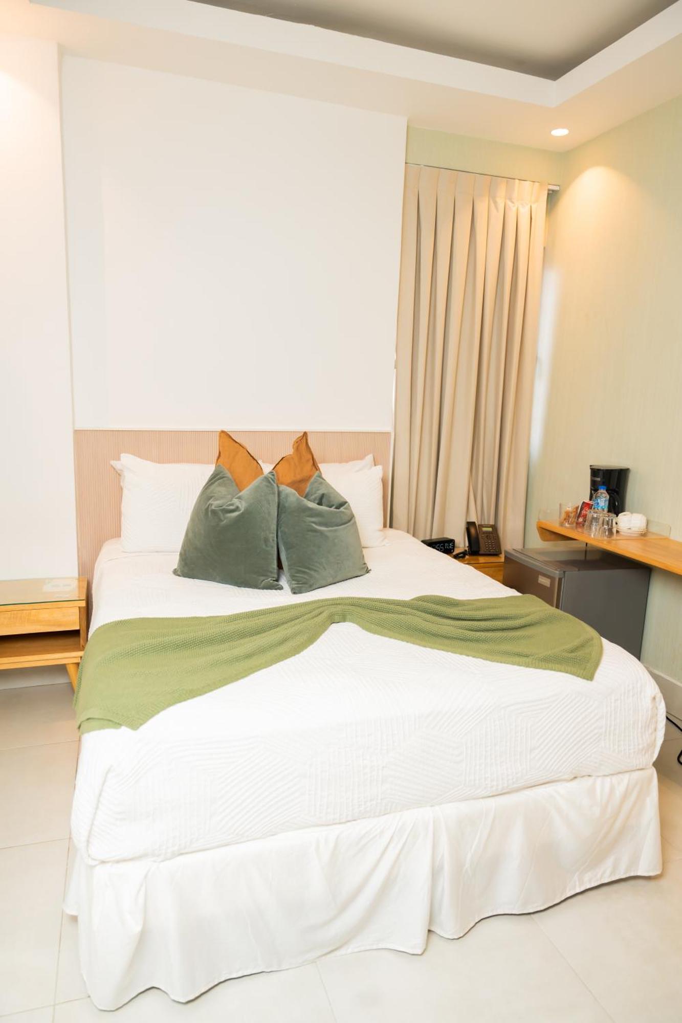 Hotel Stay Here Suites Санто-Доминго Экстерьер фото